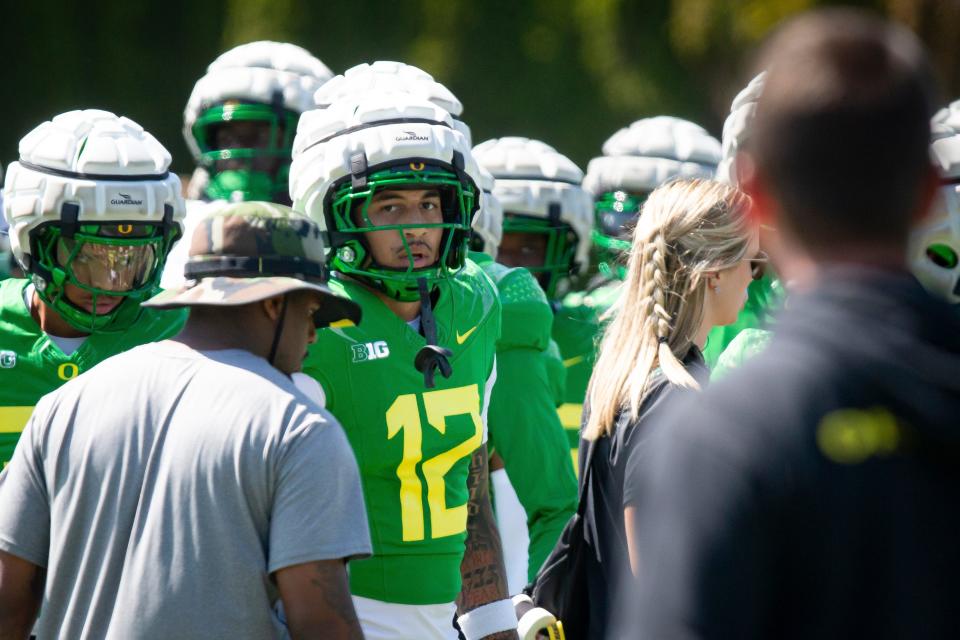 Oregon defensive back Peyton Woodyard works out during practice with the Ducks Tuesday, Aug. 13, 2024 at the Hatfield-Dowlin Complex in Eugene, Ore.