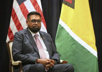 Awash in oil money, Guyana promises cash, free tuition and other perks ahead of election