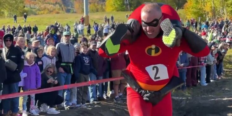 Beer and cash on offer for winners of North American wife-carrying championship in Maine