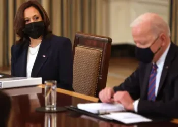 Getty Images Kamala Harris and President Joe Biden meet cabinet members and immigration advisers in the State Dining Room on March 24, 2021