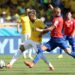 Brazil's Neymar and Chile's Arturo Vidal in action on June 28, 2014