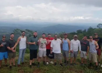GoFundMe/ Costa Rica Water Rafting Tragedy The group of 14 friends pose for a photo in the Costa Rican mountains