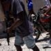 Haiti's gangs luring more children into crime and sexual abuse, HRW says, as 115 people killed in attack