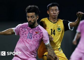 Lancing striker Luke Robinson playing for Bermuda