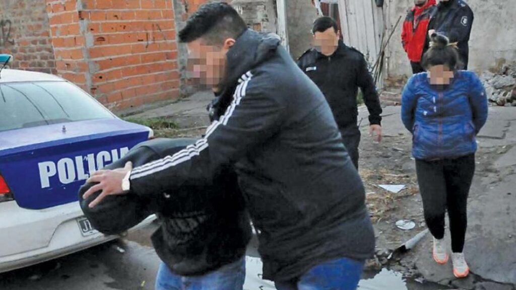 A suspect is arrested by police in Greater Buenos Aires.