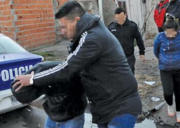 A suspect is arrested by police in Greater Buenos Aires.