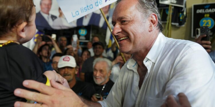 Polls open in stable Uruguay in a vote free of political hostility seen elsewhere in the region
