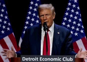 Republican presidential nominee and former US President Donald Trump addresses the Detroit Economic Club in Detroit, Michigan, U.S., October 10, 2024.