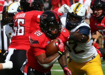 WVU defensive lineman Asani Redwood's football journey