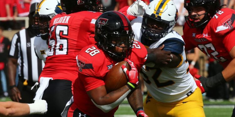 WVU defensive lineman Asani Redwood's football journey