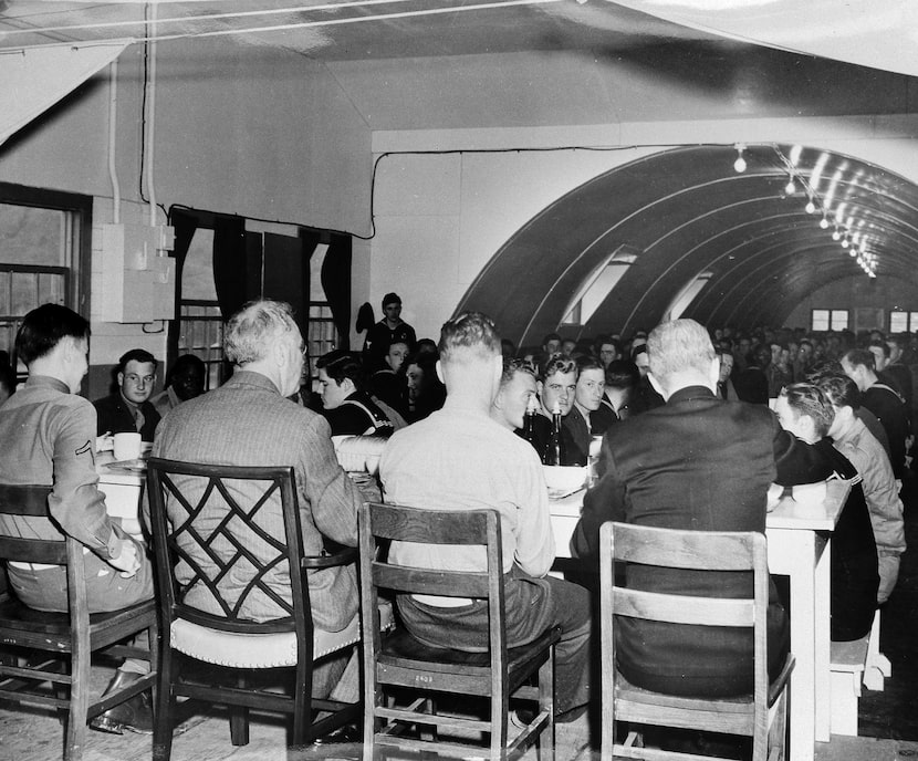 FILE - In this photo provided by the U.S. Navy, President Roosevelt, second from left, has...