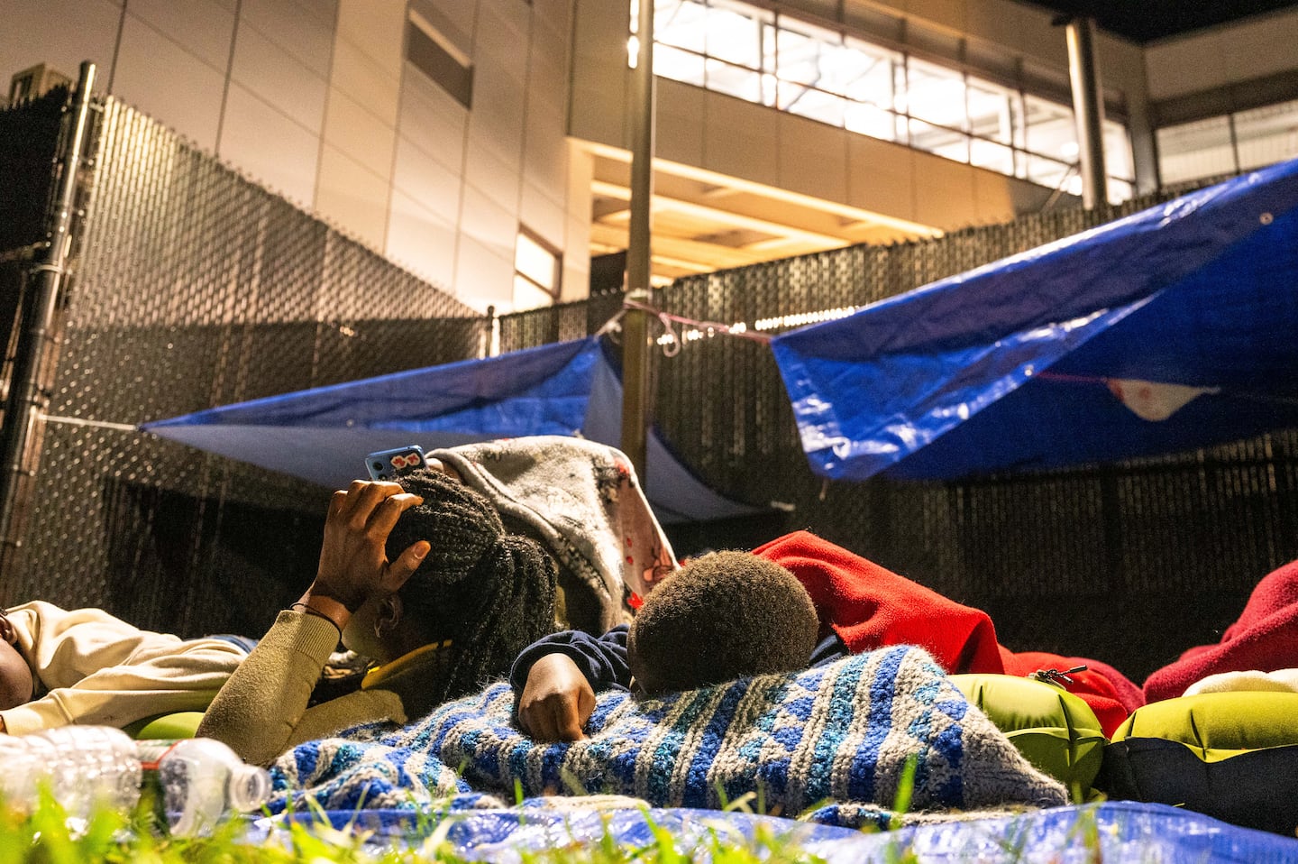 Haitian migrant families slept outside the Wollaston MBTA stop in Quincy in August.