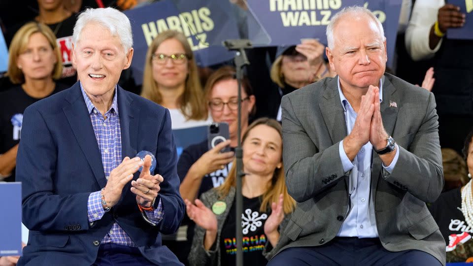 Minnesota Gov. Tim Walz appears with Clinton at the campaign rally in Durham, North Carolina, on October 17, 2024. - Steve Helber/AP