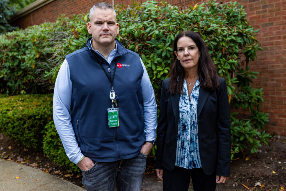 Lauren Easton and Jonathan Bunker of the Commonwealth Care Alliance, a nonprofit that oversaw several of the states hotels-turned-shelters to house migrant families. (Jesse Costa/WBUR)