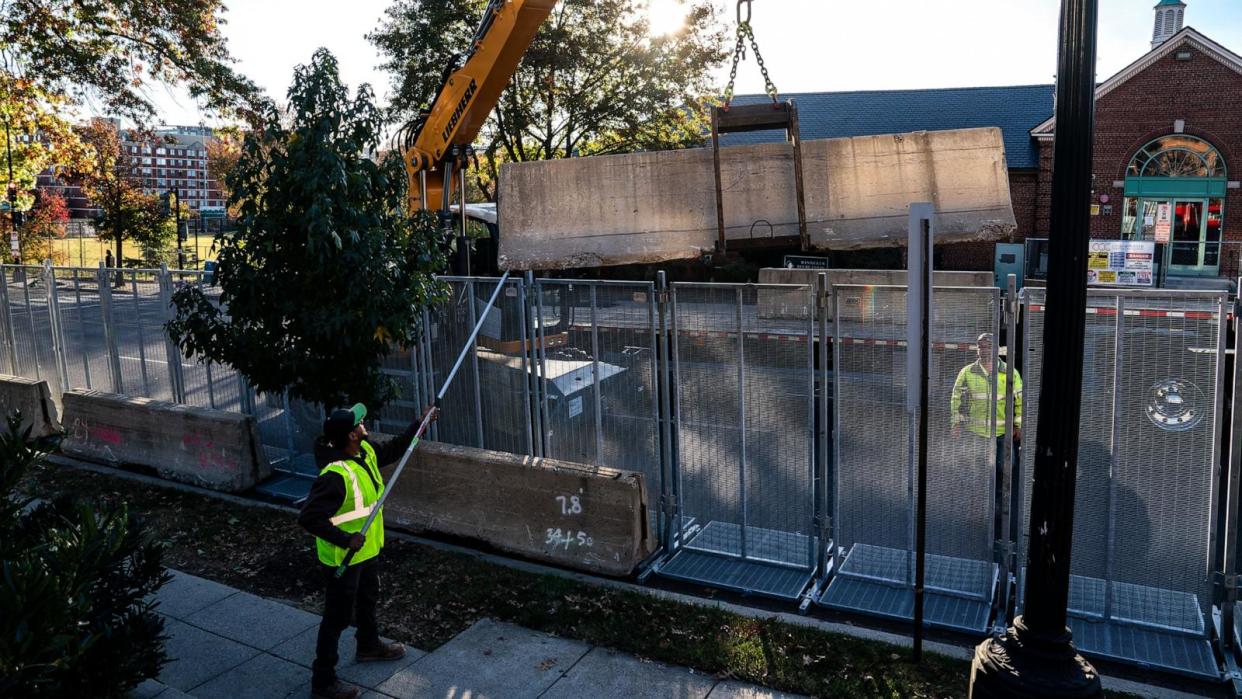 PHOTO: Workers erect anti-scale fencing and other security measures around Howard University, Nov. 3, 2024, in Washington. (Kent Nishimura/Getty Images)