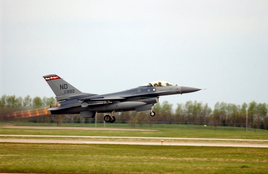 North Dakota Air National Guard F-16 takes off in afterburner.