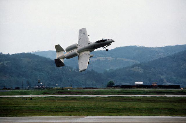 a-ground-to-air-view-of-an-a-10-thunderbolt-ii-aircraft-taking-off-during-a-9ede01