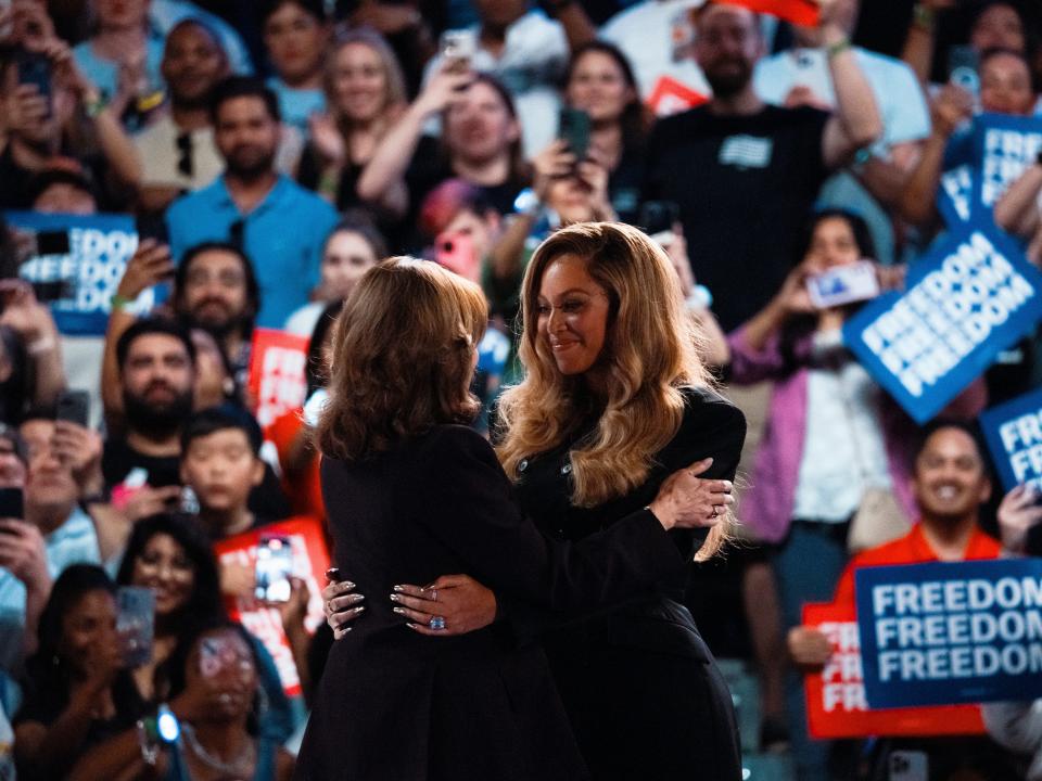 Kamala Harris embraces singer Beyoncé at a campaign rally on October 25, 2024