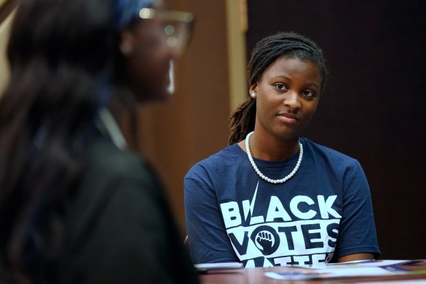 Bennett College student Zairen Jackson listens to a fellow student answer a question during a roundtable