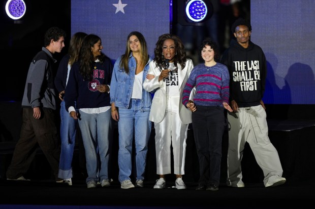 Oprah Winfrey speaks as she stands on stage at a campaign rally supporting Democratic presidential nominee Vice President Kamala Harris