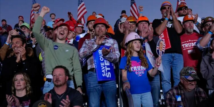 Supporters listen as Republican presidential nominee former President Donald Trump speaks during a campaign rally at Arnold Palmer Regional Airport, Saturday, Oct. 19, 2024, in Latrobe, Pa.