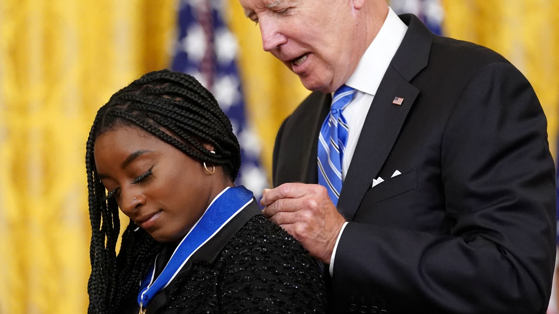 U.S. President Joe Biden awards the Presidential Medal of Freedom to U.S. Olympic gymnast Simone Biles during a ceremony at the White House in Washington, U.S., July 7, 2022.