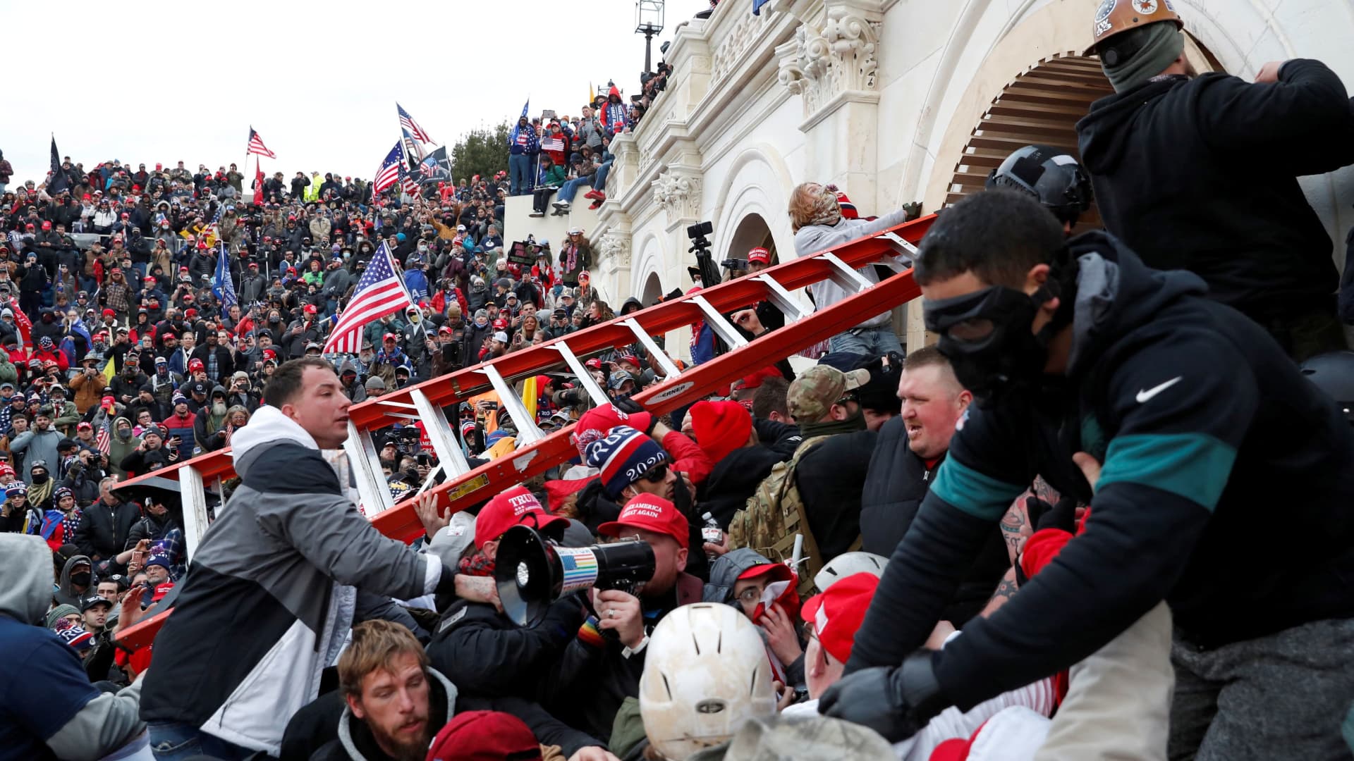 Pro-Trump protesters storm into the U.S. Capitol during clashes with police, during a rally to contest the certification of the 2020 U.S. presidential election results by the U.S. Congress, in Washington, U.S, January 6, 2021. 