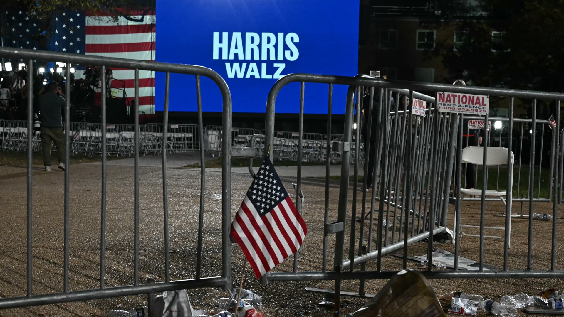 US flags are seen on the ground as people left the election night event for US Vice President and Democratic presidential candidate Kamala Harris at Howard University in Washington, DC, on November 6, 2024. 