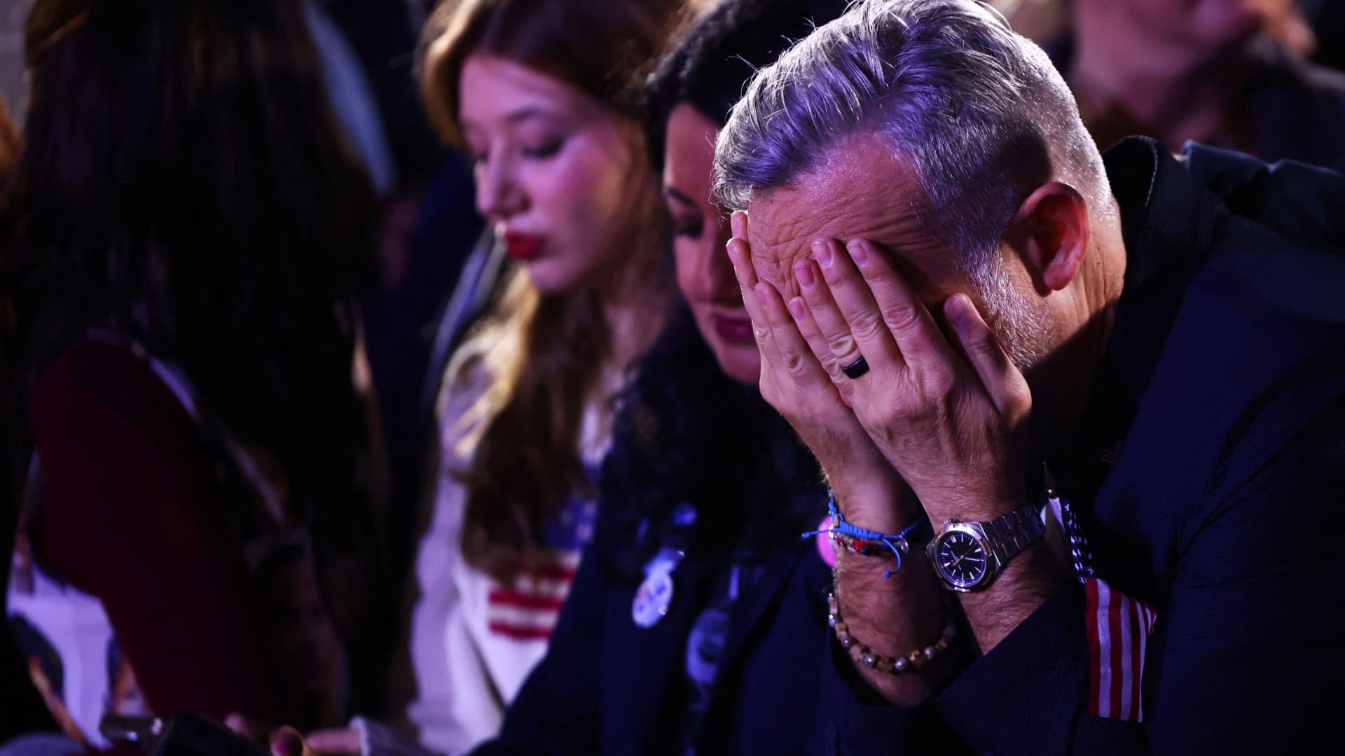 Supporters react to early election results at Democratic presidential nominee U.S. Vice President Kamala Harris' election night rally during the 2024 U.S. presidential election, at Howard University, in Washington, U.S., November 5, 2024.