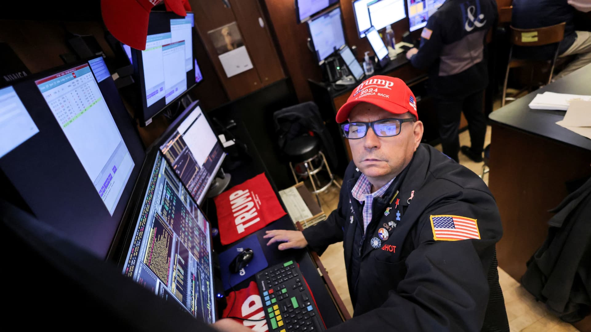 A trader wears a hat in support of Republican Donald Trump, after he won the U.S. presidential election, at the New York Stock Exchange (NYSE) in New York City, U.S., November 6, 2024. 