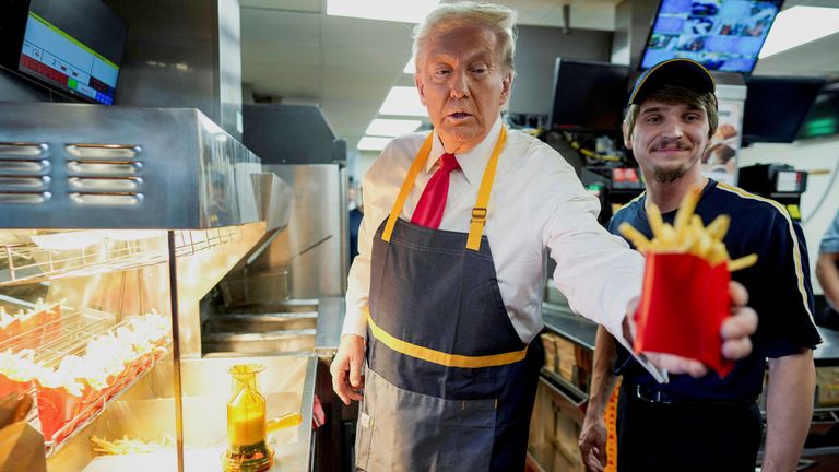 Donald Trump works behind the counter during a visit to McDonald's in Feasterville-Trevose.
Pic Reuters