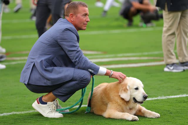 Kevin C. Cox/Getty Kirk Herbstreit and his dog Ben on Sept. 28, 2024