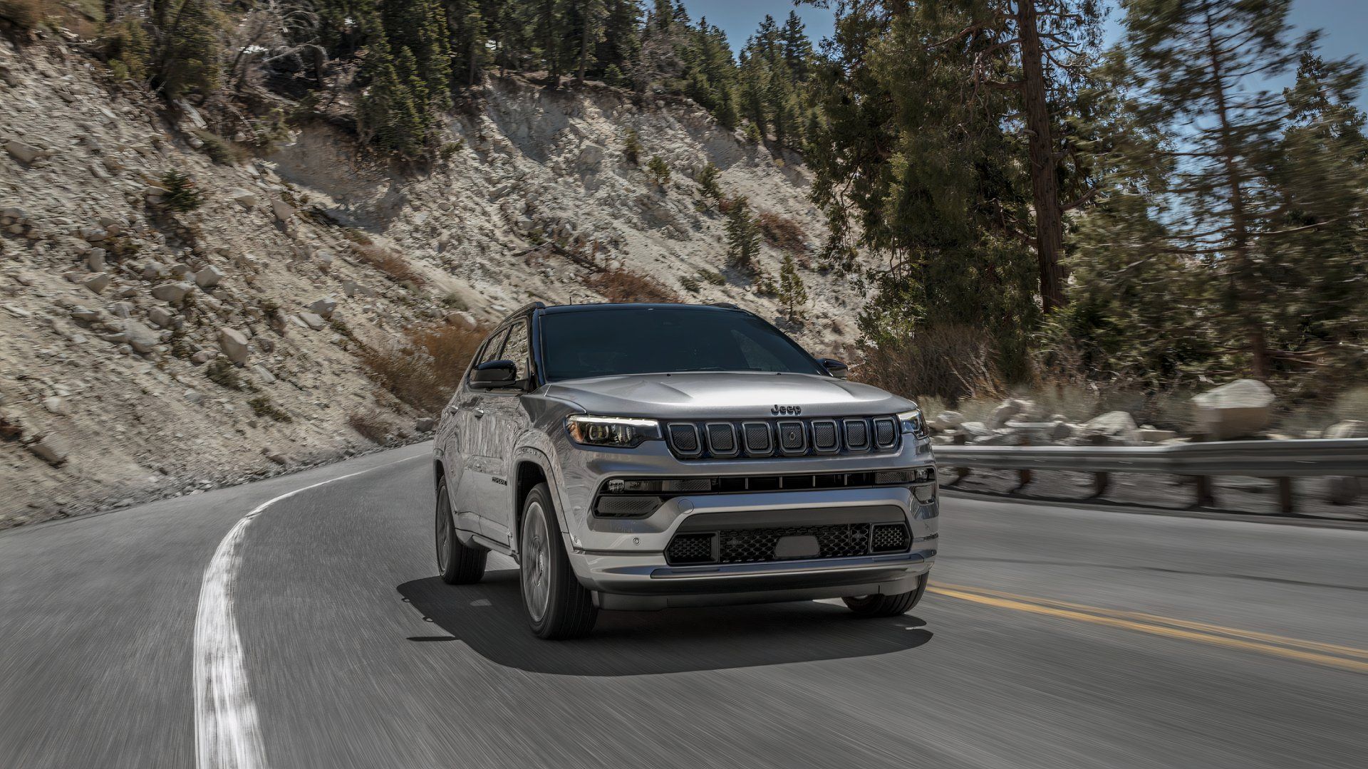 2023 Jeep Compass driving on a windy road