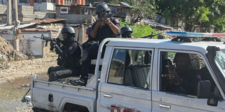 Haiti swears in new PM as gangs shoot at flight landing at airport