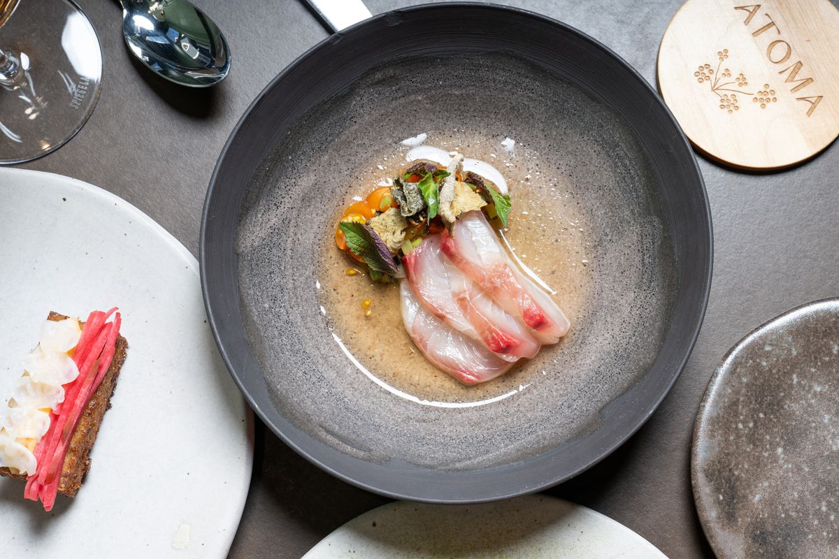 Strips of raw kanpachi on a plate.