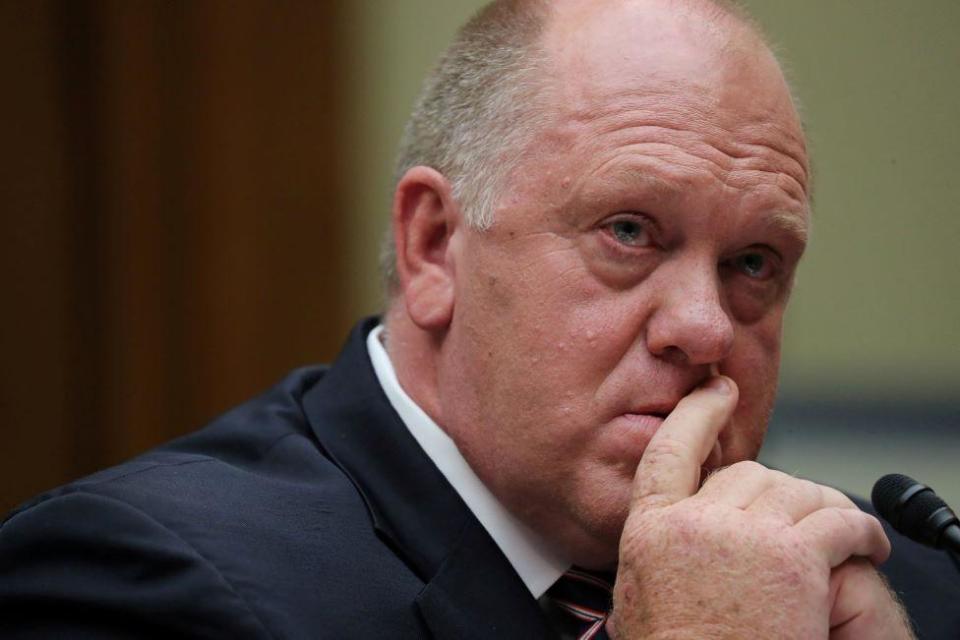 Head and shoulders pic of Tom Homan with his chin resting on his hands