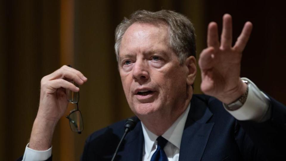 Robert Lighthizer, who has grey hair and is wearing a suit and tie, gestures during a 2017 Senate hearing