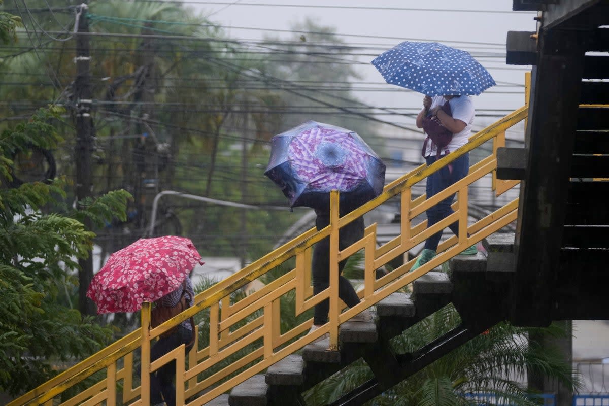 Sara has led to heavy rains in San Pedro Sula, Honduras. The tropical storm is moving to the west and will reach Belize by Sunday, forecasters said ((AP Photo/Moises Castillo))