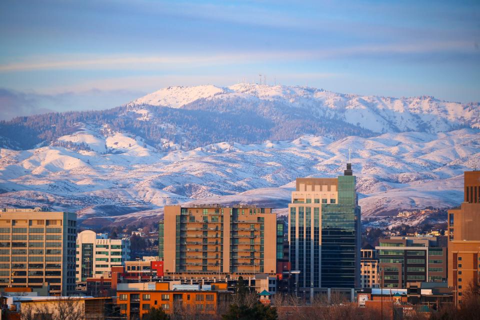 Skyline of downtown Boise, Idaho, with Bogus Basin Ski Resort in the background.