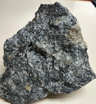 A piece of ore from the Stibnite Creek antimony prospect in the Alaska Range. (Alaska Division of Geological and Geophysical Surveys)