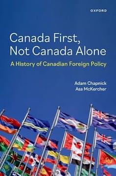 A book cover that says Canada First, Not Canada Alone with a collection of flags