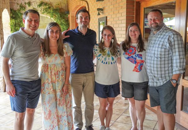 Team members Enoch and Laura Rinks, Ale and Brittnea Yegros and Cara and Josh Blackmer meet at a hotel in Asunción.