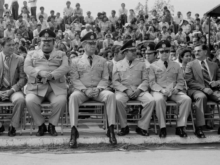 Salvadoran military commanders and the head of the Treasury Police, Col. Nicolás Carranza (third from the left), sit during a military ceremony at the Escuela Militar Capitán General Gerardo Barrios in Santa Tecla, El Salvador, in May 1983.