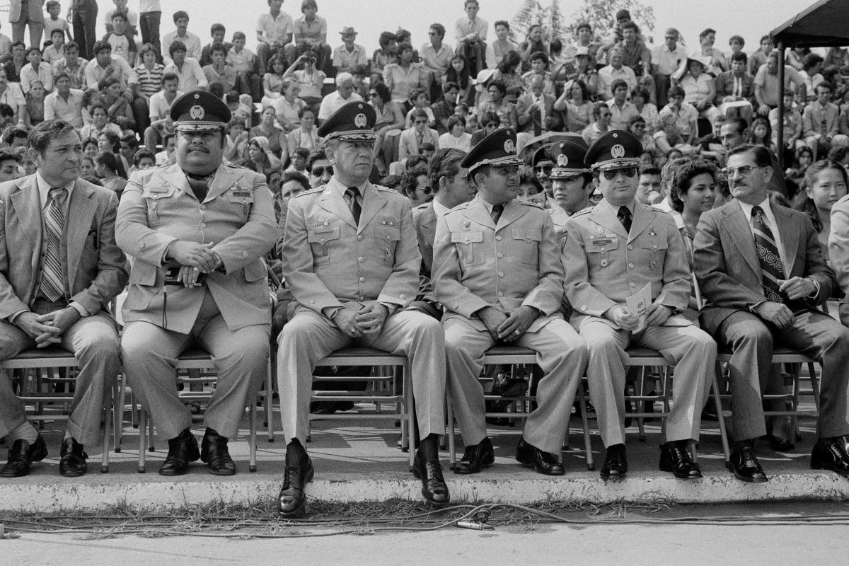 Salvadoran military commanders and the head of the Treasury Police, Col. Nicolás Carranza (third from the left), sit during a military ceremony at the Escuela Militar Capitán General Gerardo Barrios in Santa Tecla, El Salvador, in May 1983.