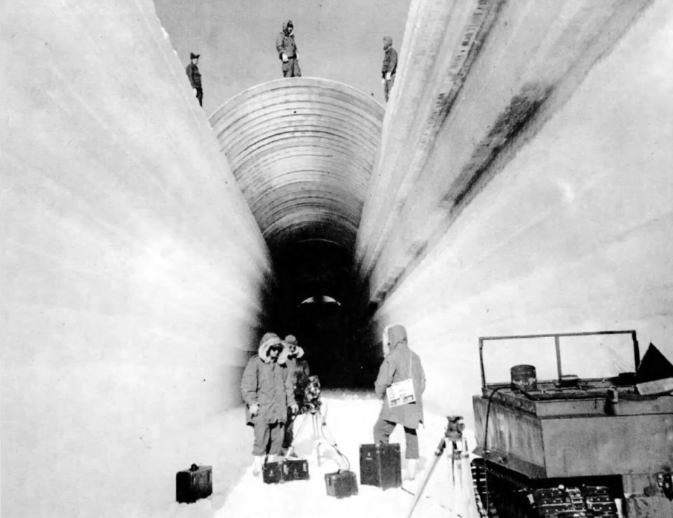 Workers building the icy trenches at Camp Century in 1960