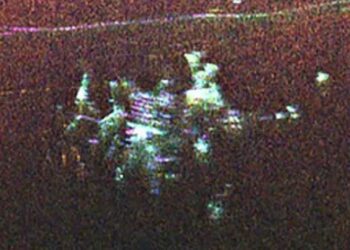 NASA scientist takes stunning photo of vast ice sheet - and accidentally discovers top secret 'city' buried deep beneath