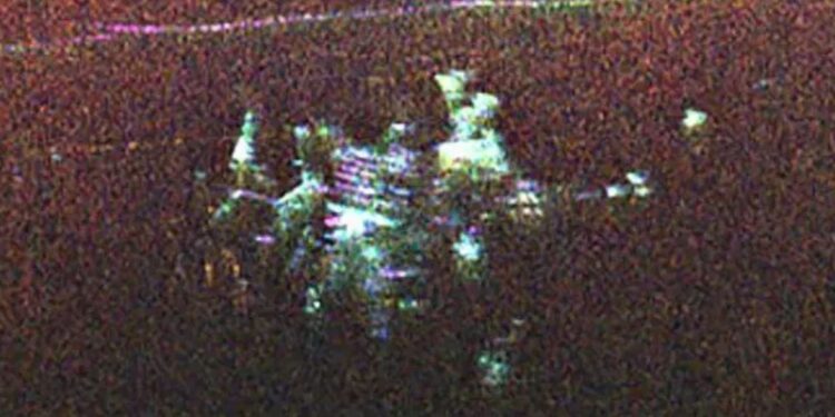 NASA scientist takes stunning photo of vast ice sheet - and accidentally discovers top secret 'city' buried deep beneath