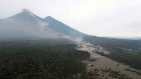 EPA Aerial view of the San Miguel Los Lotes hamlet, after yesterday's eruption of the Fuego volcano, in Escuintla, Guatemala, 04 June 2018.