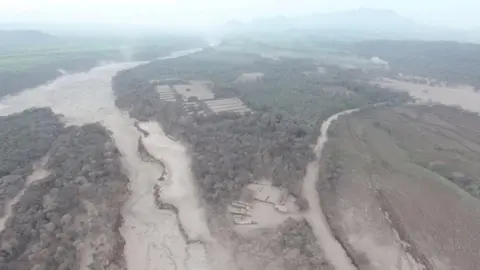 Reuters Aerial view of the aftermath of a volcano eruption in Escuintla, Guatemala, is seen in this picture obtained June 4, 2018 from social media.