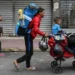 Getty Images A Venezuelan family heads to the Temporary Housing Center for Migrants San Antonio Casa Esperanza after walking for weeks in order to cross into Colombia and continue their journey to the United States, in San Antonio del Tachira, Venezuela, on September 25, 2022.